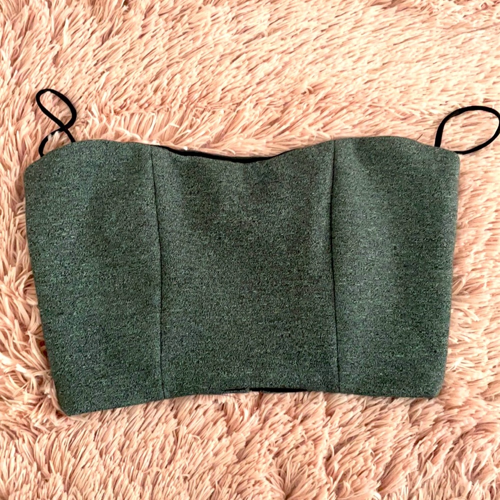 Charcoal grey top with skinny straps and zipper back.